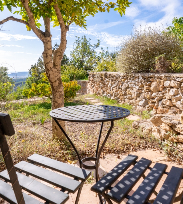 Resa Estates Ibiza finca for sale te koop st Jordi chairs exterior.jpg